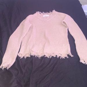 a beige/khaki/tan sweater